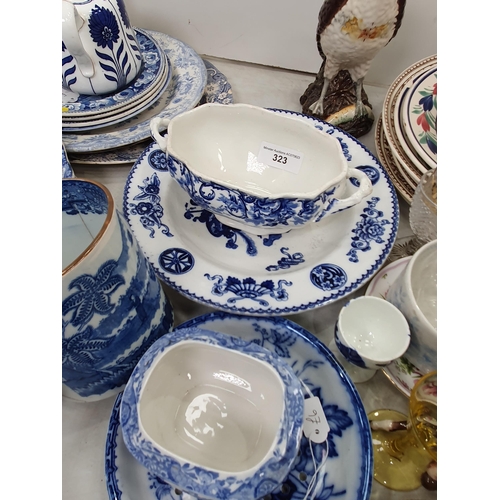 323 - A quantity of blue and white China including Plates, Mug, Sauce Tureens, etc, and various Plates, a ... 