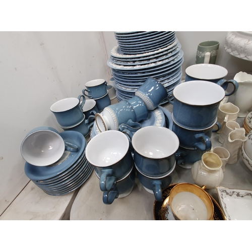 329 - A quantity of Wedgwood embossed Queensware dinnerware including Plates and Bowls, a Denby Coffee Ser... 