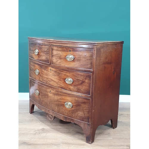 44 - A 19th Century mahogany Bow Front Chest of two short, two long Drawers, 2ft 10