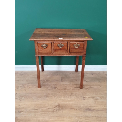 451 - A Georgian fruitwood Lowboy, fitted three drawers on square cut chamfered supports, 2ft 5