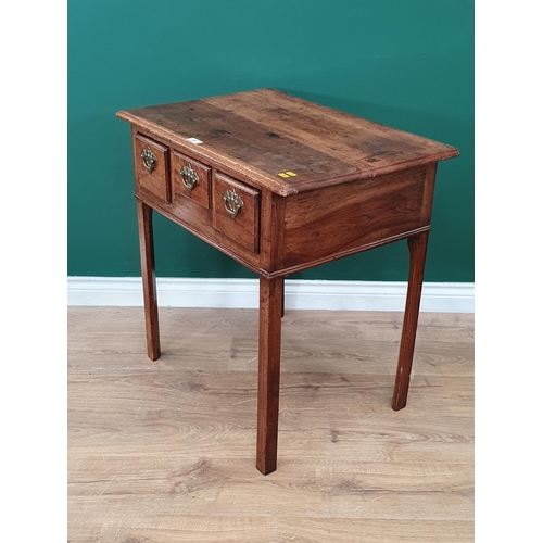 451 - A Georgian fruitwood Lowboy, fitted three drawers on square cut chamfered supports, 2ft 5