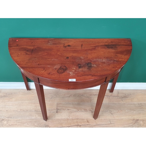 453 - A 19th Century mahogany Demi-Lune Side Table on square tapered supports, 2ft 4