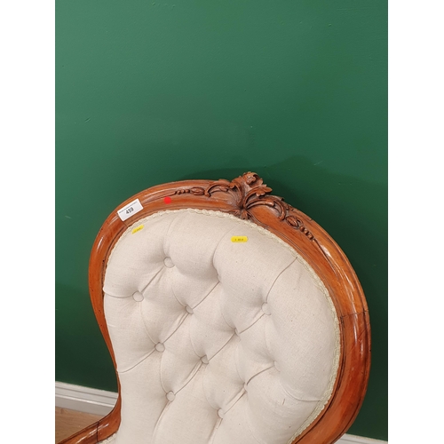 459 - A floral upholstered mahogany framed Elbow Chair with inlaid decoration and a button back Nursing Ch... 