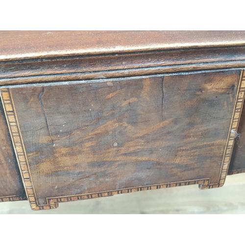 475 - A 19th Century mahogany Fold over Tea Table with satinwood stringing, on square tapered supports, A/... 