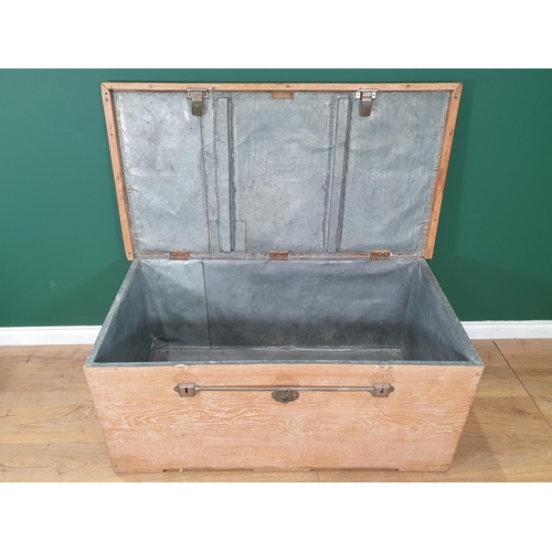 493 - A large antique light oak zinc lined Blanket/Storage Chest with strap lock and carry handles,  1ft 1... 