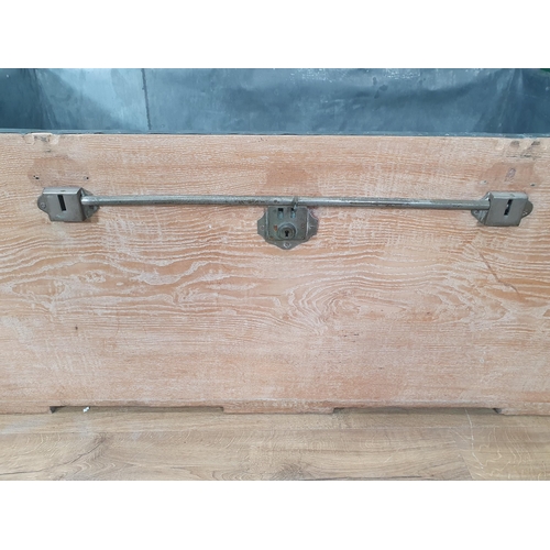 493 - A large antique light oak zinc lined Blanket/Storage Chest with strap lock and carry handles,  1ft 1... 