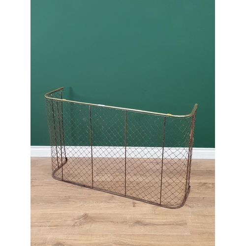 52 - A brass and wirework Fender, 3ft 6