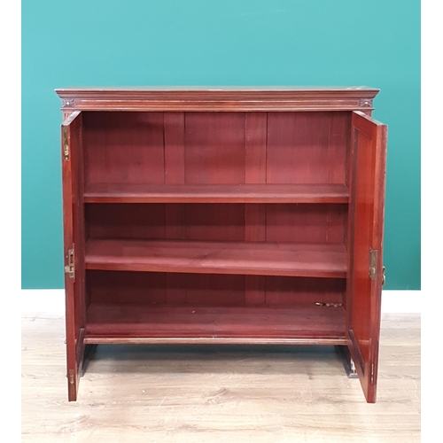 76 - A mahogany panelled door Cupboard fitted with two adjustable shelves (Probably the Top Section of a ... 