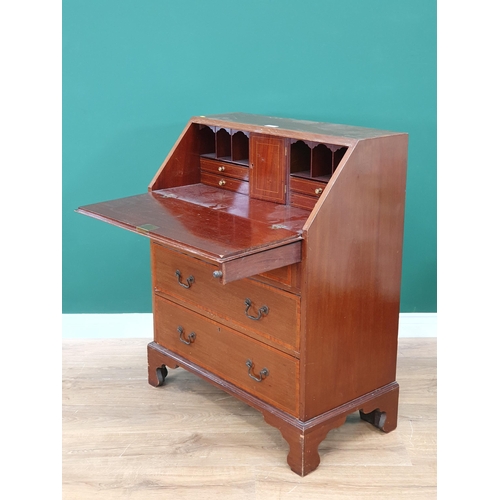 78 - A mahogany and satinwood Bureau the fall front with inlaid urn and swag decoration, enclosing fitted... 