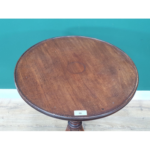 80 - A mahogany circular top Tripod Table on turned column, splayed supports and castors A/F.