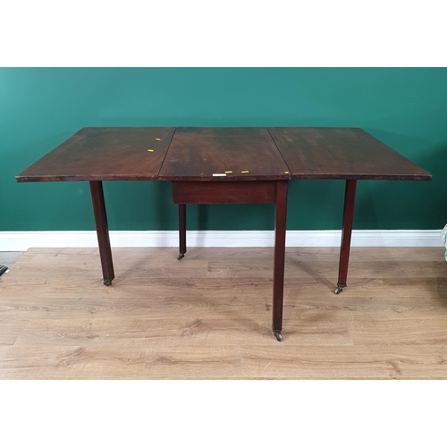 83 - A 19th Century mahogany Dropleaf Table on chamfered supports and castors, 3ft Long x 2ft 5