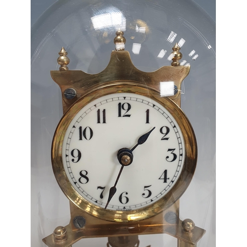 222 - A brass perpetual Clock with enamel dial under glass dome, 12in H