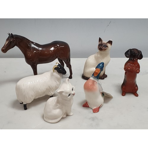 234 - Six Beswick Figures including a begging Dachshund, a Sheep, two Cats (one has a chipped ear), a Duck... 