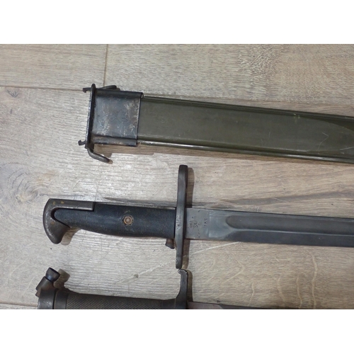 1103 - A Lee Enfield Spike Bayonet, a US Bayonet and another Bayonet