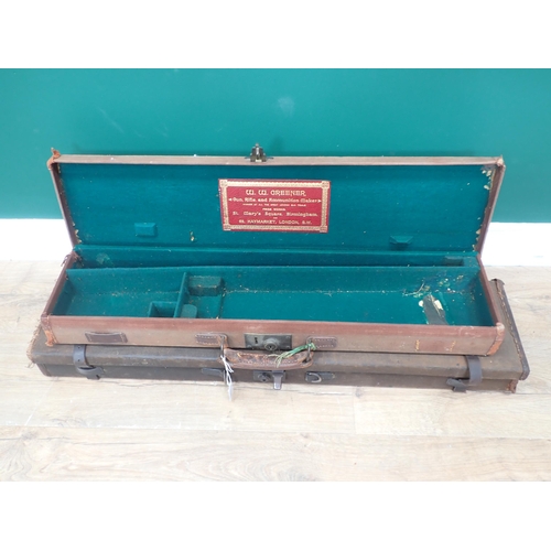 1105 - A canvas hard Gun Case for a .410 or 28 bore bearing W.W. Greener label to inside of lid, fitted wit... 