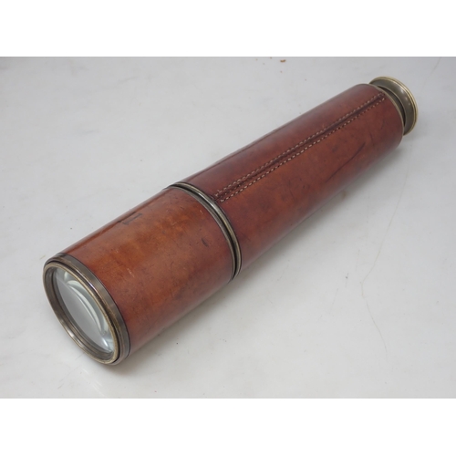 1111 - A WWI period leather covered Telescope by Broadhurst Clarkson & Co in fitted leather case and a pair... 