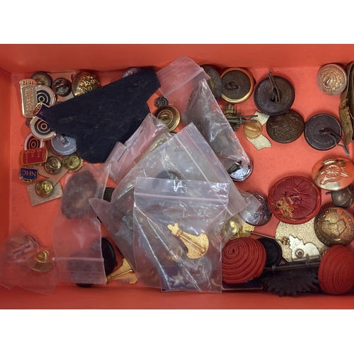 1116 - A box of Military and Police Cap Badges, Buttons and other Badges including 1899 Queen's Prize Posit... 