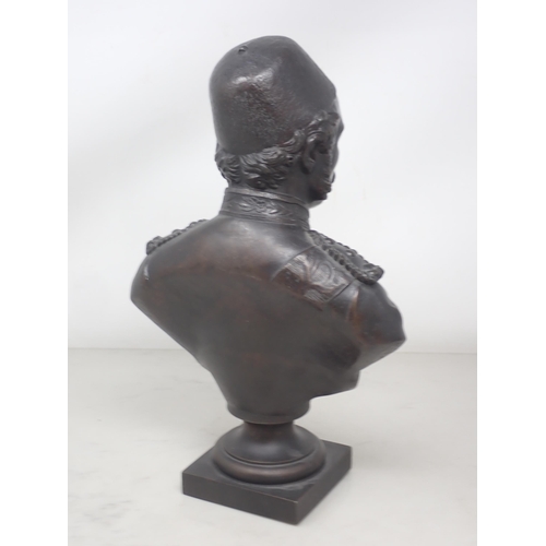 1125 - A hollow cast Bust of General Gordon Pasha 12in H and a 'Chinese Gordon' black glass Inkwell