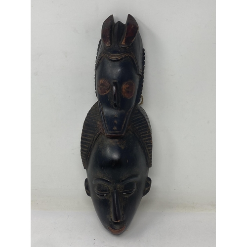 1137 - A Congo Baule Face Mask 14inL, a Ugandan double Face Mask 16 1/2in L and a Shrine Broom from Gabon