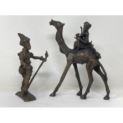 1138 - Burkino Faso, a bronze Sculpture of a Warrior 9in H, bronze Sculpture of a Mossi Soldier mounted on ... 