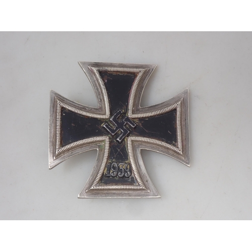 1144 - A German First Class 1939 Iron Cross (slightly misshapen)