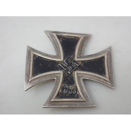 1144 - A German First Class 1939 Iron Cross (slightly misshapen)