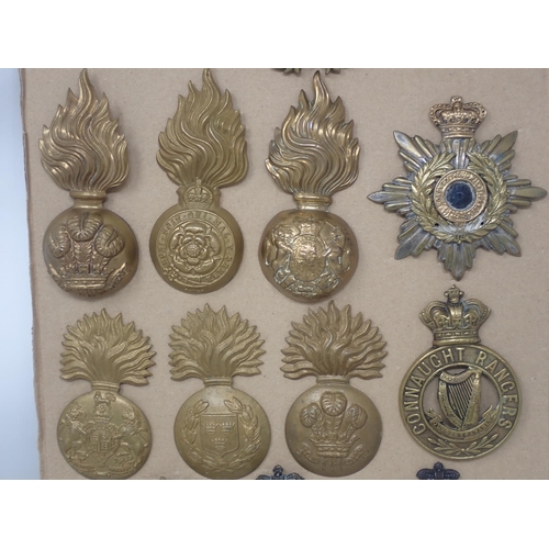 1176 - Fourteen British Army Cap Badges including Royal Engineers, Connaught Rangers and Irish Lights, etc.