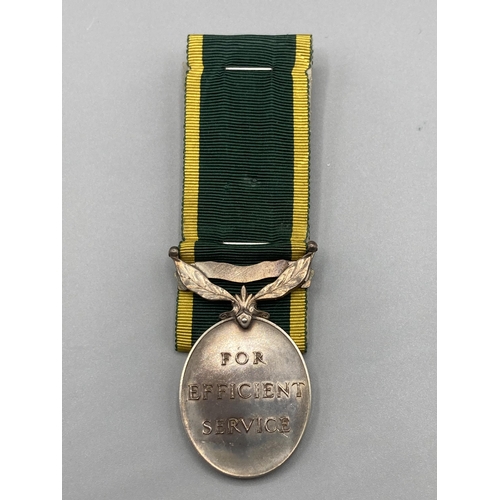 1057 - Territorial Efficiency Medal to 2983995 Corporal J. Wilson, Argyll & Sutherland Highlanders