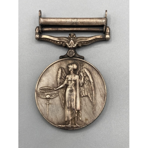 1064 - General Service Medal with Arabian Peninsula Clasp to Civilian J.P. Jenks, lacking ribbon