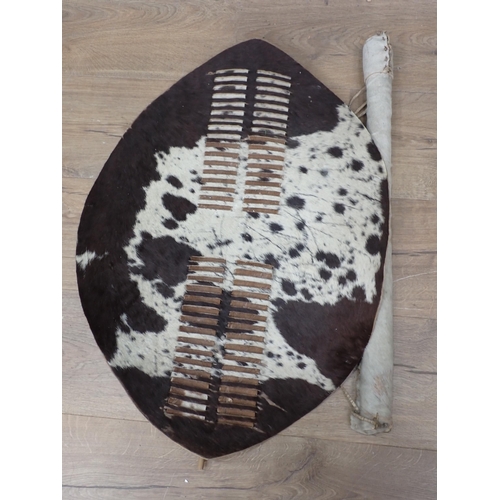 1024 - An East African hide Shield 2ft 3in x 1ft 6in and a Quiver