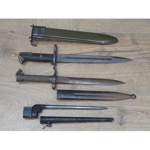 1103 - A Lee Enfield Spike Bayonet, a US Bayonet and another Bayonet