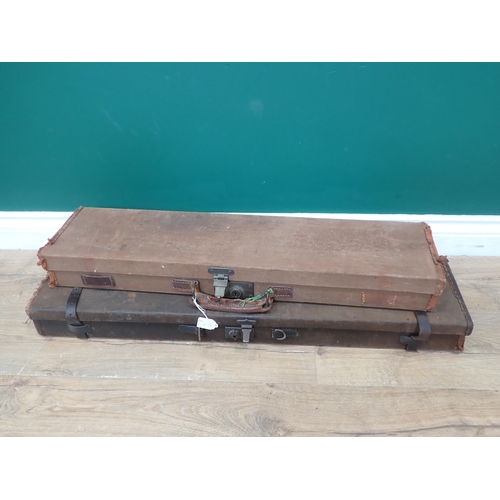 1105 - A canvas hard Gun Case for a .410 or 28 bore bearing W.W. Greener label to inside of lid, fitted wit... 