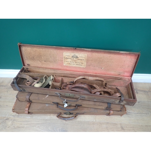 1106 - A canvas covered hard Gun Case bearing John Macpherson label for 28in barrels, another with Russell ... 