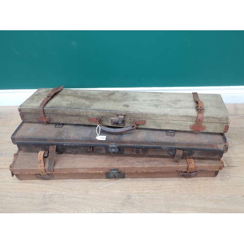 1107 - A canvas covered hard Gun Case bearing Army and Navy label for 30in barrels, another with W.R. Leeso... 