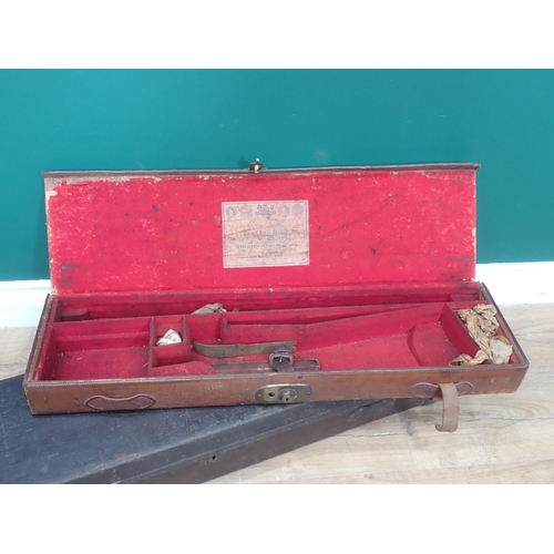 1108 - An antique leather covered oak Gun Case bearing label for George H. Daw lacking fitted interior and ... 