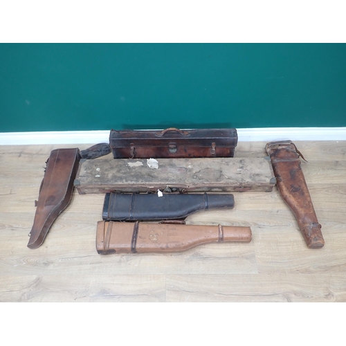 1109 - A hard Sporting Rifle Case bearing John Rigby and Co. label, a leather Gun Case and four Leg of Mutt... 