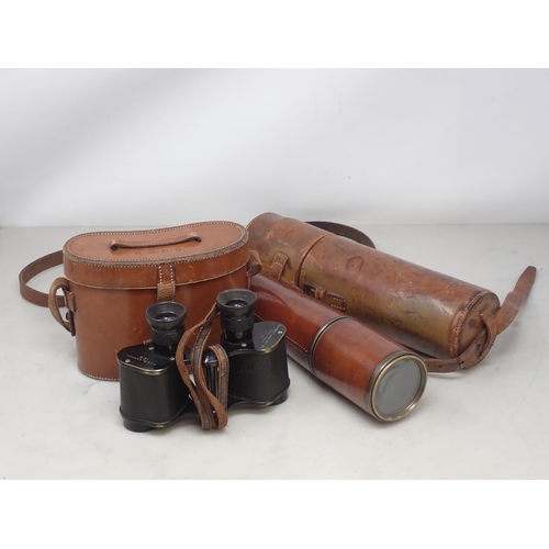 1111 - A WWI period leather covered Telescope by Broadhurst Clarkson & Co in fitted leather case and a pair... 