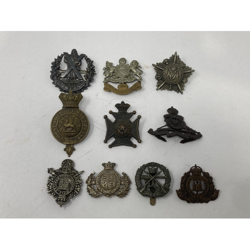 1115 - Ten British Army Cap Badges including The Suffolk Regiment, The London Rifle Brigade, Cameron Highla... 