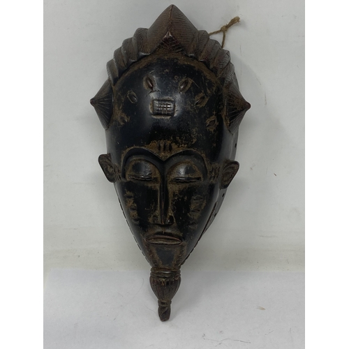 1137 - A Congo Baule Face Mask 14inL, a Ugandan double Face Mask 16 1/2in L and a Shrine Broom from Gabon