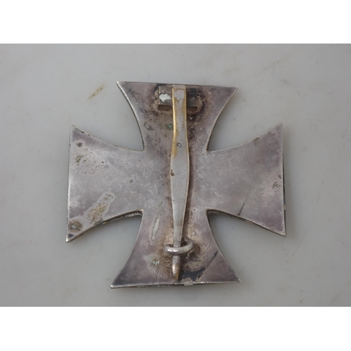 1144 - A German First Class 1939 Iron Cross (slightly misshapen)