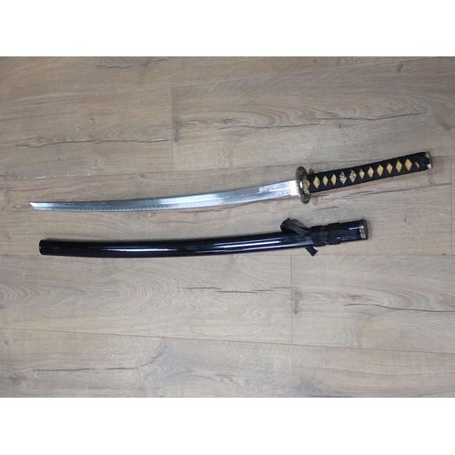 1167 - A Japanese Katana stamped C. Jul. Herbertz 3ft 6in overall
.