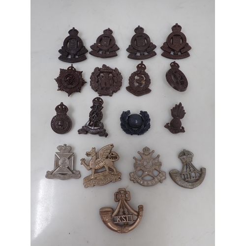 1179 - Seventeen plastic British Army Cap Badges including Royal Army Ordnance Corps, Royal Corps of Signal... 