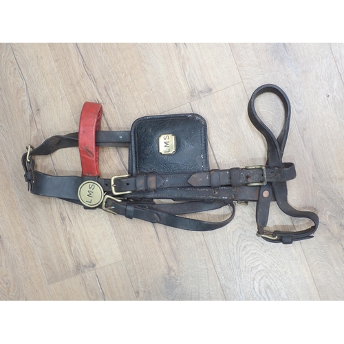 1180 - An LMS Horse Harness including luggage girth and bridle with brass mounts