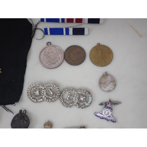 1237 - A collection of British Badges and Medals including Royal Army Medical Corps, Argyll & Sutherland Hi... 