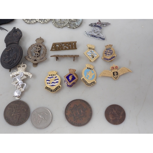 1237 - A collection of British Badges and Medals including Royal Army Medical Corps, Argyll & Sutherland Hi... 