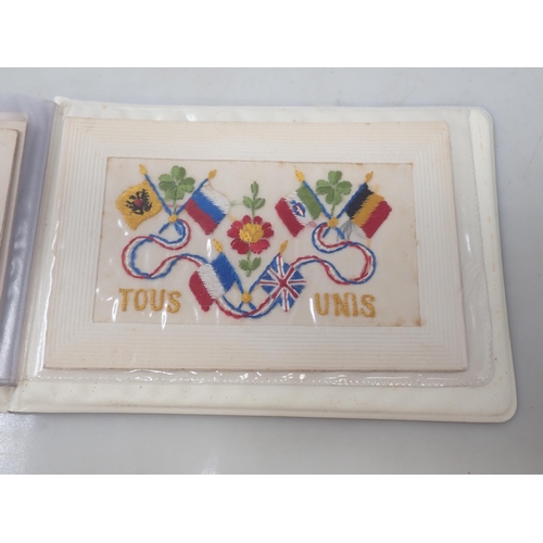 1238 - An Album of twelve First World War embroidered Postcards