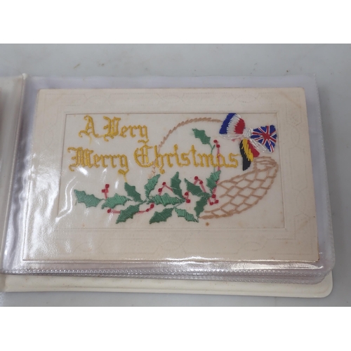 1238 - An Album of twelve First World War embroidered Postcards