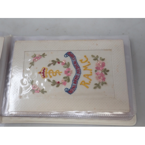 1238 - An Album of twelve First World War embroidered Postcards