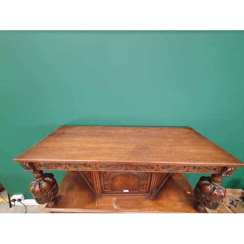 34 - A reproduction oak Court Cupboard with central cupboard flanked by turned columns, above pair of fit... 