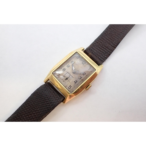 102 - A 1930's Longines Wristwatch the rectangular dial with arabic numerals and subsidiary dial at 6 o'cl... 